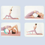 Woman in workout clothes demonstrating yoga wheel exercises on a yoga mat for SportQ Egypt.