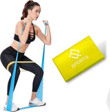 Woman exercising with blue resistance band and yellow SPORTQ power band, home gym equipment.